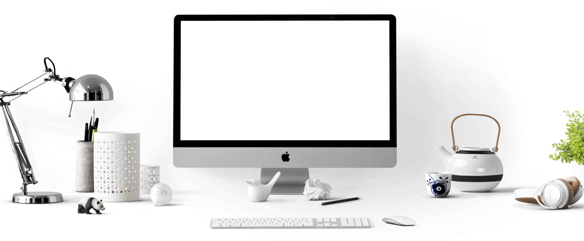 Dublin Accountants image of an apple screen and other white objects on a white desk